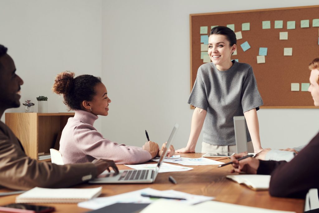 Business people working over table in conference room